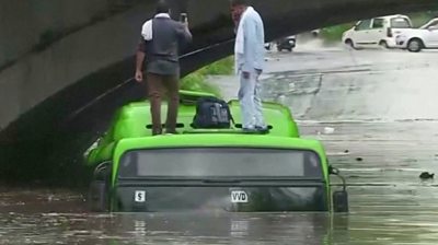 Monsoon rains caused flooding in several areas of India's capital Delhi on Sunday.