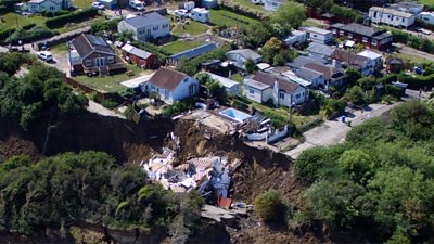 House falls due to cliff erosion