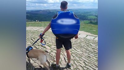 Ben with a tyre on his back