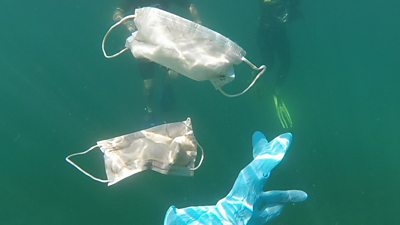 Masks and gloves in the sea