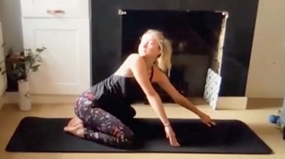 Lydia Strange on yoga mat