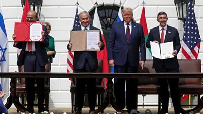 The UAE and Bahrain sign agreements fully normalising their relations with Israel at the White House.