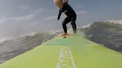 Nate surfing