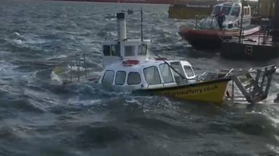 Harwich Harbour Ferry half submerged in gale-force winds