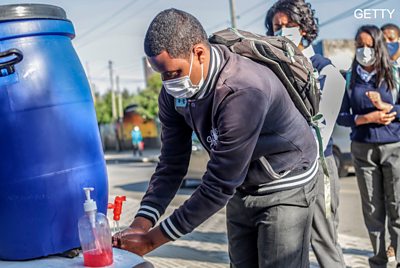 A man washes his hands in Addis Ababa, Ethiopia. Credit: Getty Images