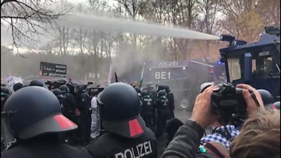 Berlin police use water cannon during protest