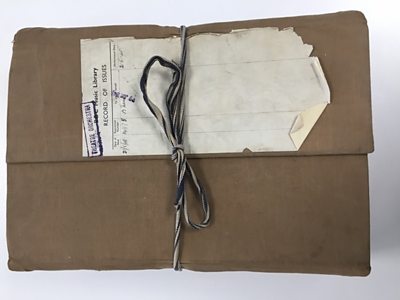 Bundle of papers tied with laces