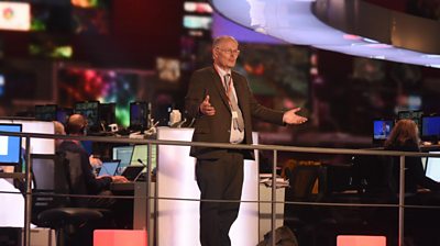 Professor Sir John Curtice looks down from the balcony in the Elstree election studio