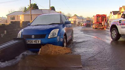 Cars stuck in flood water in Skewen