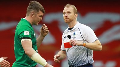 Peter O'Mahony is shown a red card by Wayne Barnes