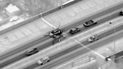 Helicopter footage shows the car driving past 57 vehicles on the wrong side of the road.