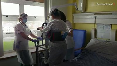 Hospital patient being helped by occupational therapists