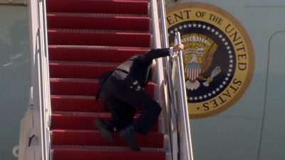 Joe Biden stumbles while climbing stairs to aircraft