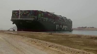 Suez Canal operation to free Ever Given 'could take weeks'