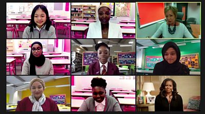 Former First Lady Michelle Obama speaks to schoolgirls