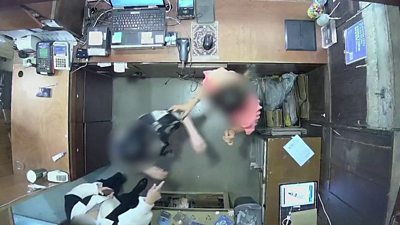 CCTV footage of confrontation in shop