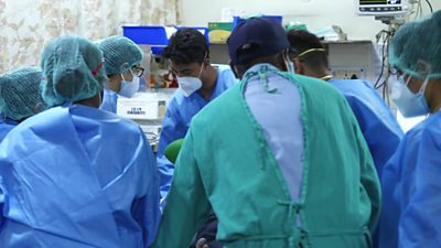Doctors battle to save coronavirus patients