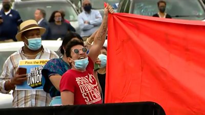 protesters disrupt Biden