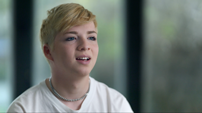 Teenager wearing a white t-shirt