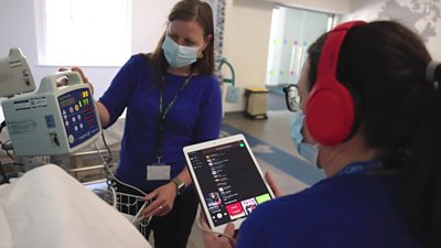NHS workers taking part in a trial on how music can help patients