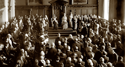 On 22 June 1921 thousands line the street to see King George V open the Northern Ireland parliament.