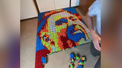 Portrait of Christian Eriksen using Rubik's cubes half complete