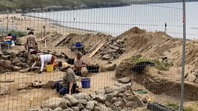 digging at the beachside burial site