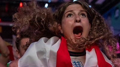 England fan in Croydon cheering while watching the match