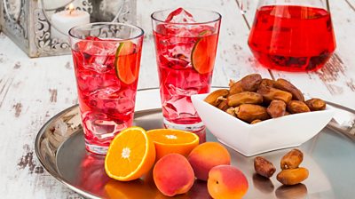 Rooh Afza - a cold syrup drink, sweet dates and fruit