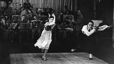 Dancers Carol Chilton and Maceo Thomas in full swing for a direct relay to RadiOlympia, 1936.