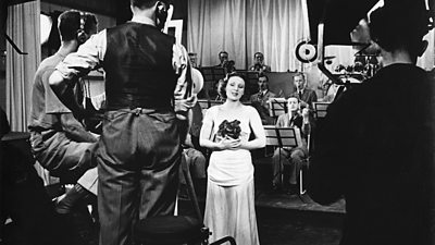 Singer Helen McKay accompanied by Lew Stone's Band for RadiOlympia, 1936.