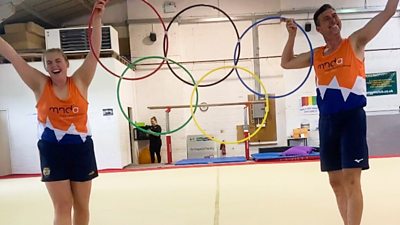 Charlotte and Stuart pose with their own Olympic rings