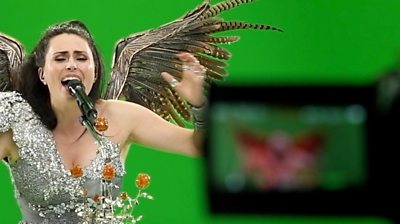 Sharon den Adel of Within Temptation, performing in front of a green screen