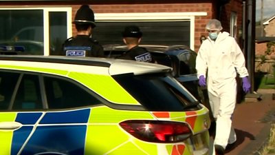 Forensic officer outside the house in Kidderminster