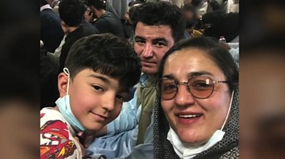 Burhan and his family on the plane