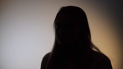 Silhouette of a young woman