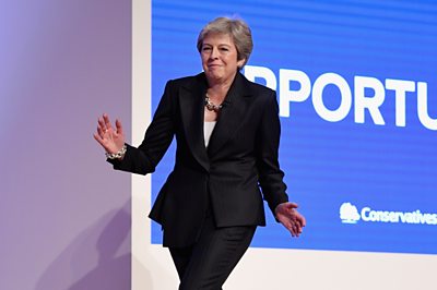 Theresa May dancing on stage at the 2018 Conservative party conference