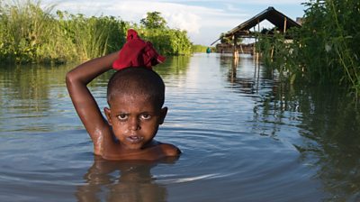 A child standing in water