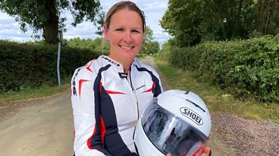 Claire Lomas in her wheelchair and wearing biker leathers which she'll be doing the London Marathon in