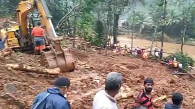 A digger in the mud in Kerala, India