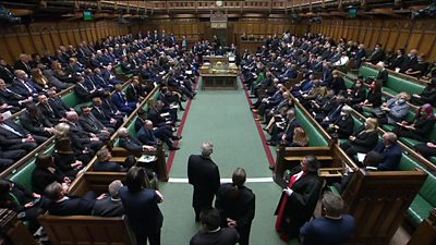 House of Commons stands in silence