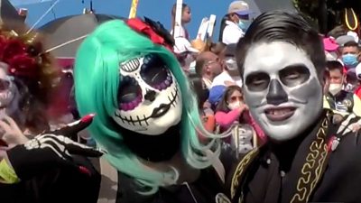 Parade revellers celebrate Day of the Dead in Mexico City