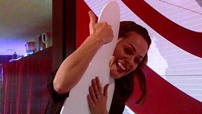 BBC broadcaster Victoria Fritz hugs a cardboard cut out