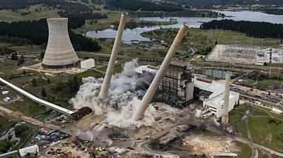 Chimneys fall in power plant demolition