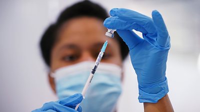 File photo: A nurse preparing a Covid vaccine