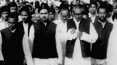 Kamal Hossain and Sheikh Mujib with a large crowd of people