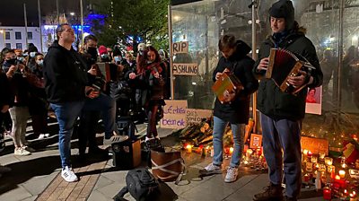 Musicians play at a vigil in Galway for Ashling Murphy