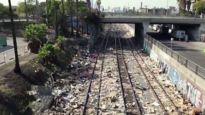 Railway tracks covered in rubbish