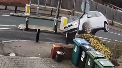 Videos of cars and a police van colliding with the width restriction have been widely shared online.