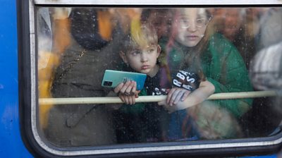 Child in train window in Ukraine